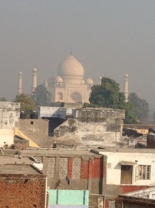 The Taj Mahal through the haze from the hotel roof top.